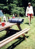 Jen cleaning up her backyard