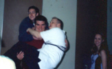 Chris trying to lick Drew's ear