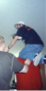 Derek on Tyler's shoulders to get the wax back