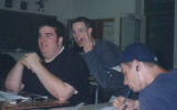 Ryan giving the finger behind Drew