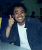 John smiling and giving the thumbs up to the camera