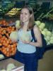 Val holding her melons. Mmmm, melons!