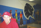 Tim in front of the new mural, piece of crap(the mural not Tim)