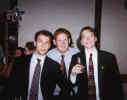 Ryan with friends and a beer