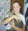 Val holding her cat